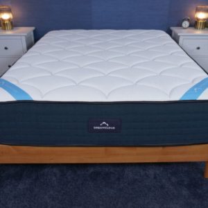 the dreamcloud premier mattress in a bedroom with no bedding