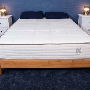 the nolah natural mattress in a bedroom with no bedding