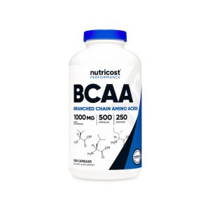 a closeup of a bottle of Nutricost BCAA capsules against a white background
