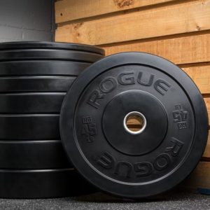 a stack of rogue fitness rubber bumper plates