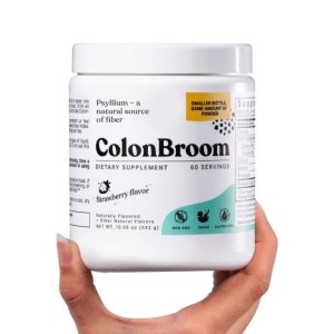 Hand holding a container of ColonBroom