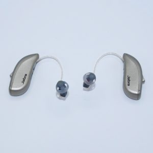 a pair of jabran enhance 300 rechargeable hearing aids