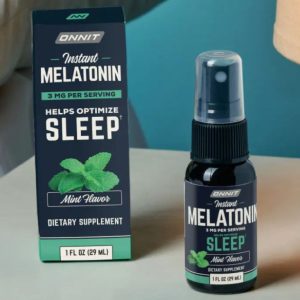 A bottle of Onnit Melatonin Spray sits on a table.