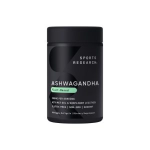 A black bottle of ashwagandha plant-based capsules with a green accent, placed against a white background.