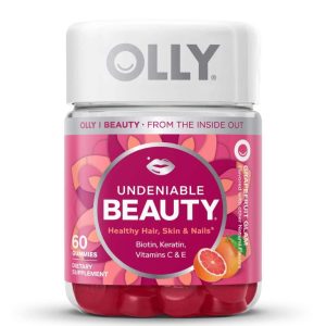 the olly undeniable beauty hair, skin, and nail gummies against a white background