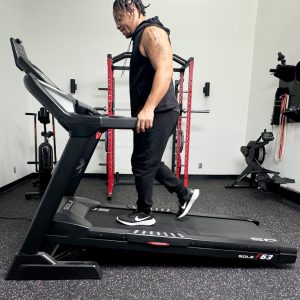 man is running on treadmill sole fitness f63