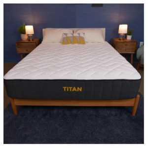 frontal-view-of-a-titan-plus-mattress-laying-on-a-bedframe-in-a-bedroom