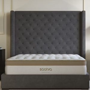 Premium memory foam mattress with a tufted headboard in a sophisticated bedroom