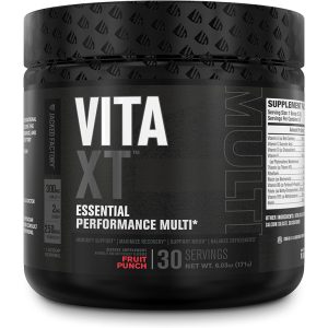 Black jar labeled "Vita XT Essential Performance Multi" by Jacked Factory, with 30 servings and fruit punch flavor, indicating it supports immunity, recovery, mood, and balances deficiencies.