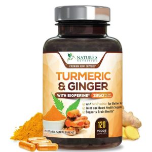 a bottle of natures way tuermeric and ginger on a white backdrop with capsules powder ginger and curcumin seeds