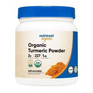 a tub of nutricost organic turmeric powder on a white background